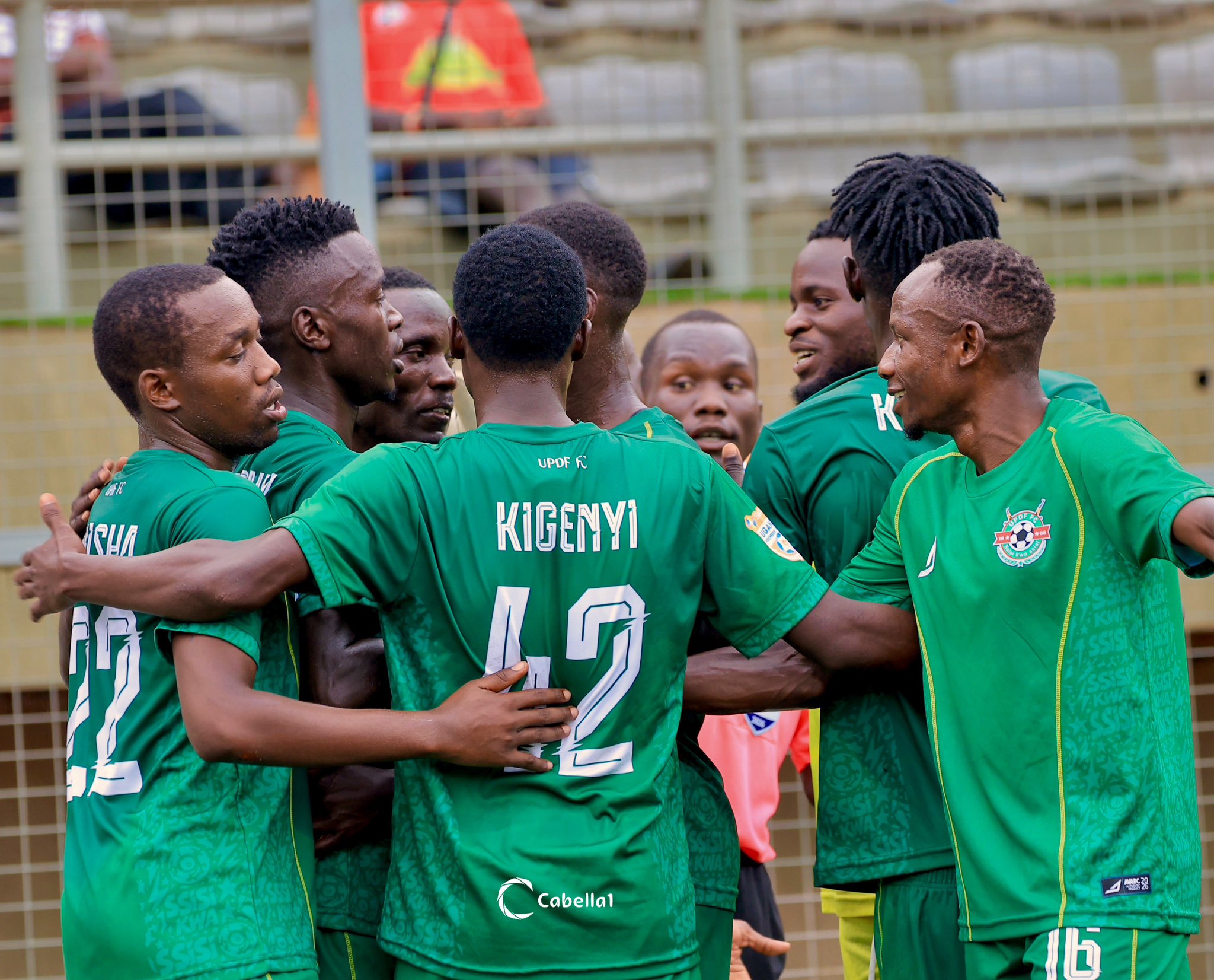 UPDF FC team celebrating a Goal against Maroons FC